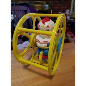 Vintage Bozo the Clown Rolling Wheel Baby Toy